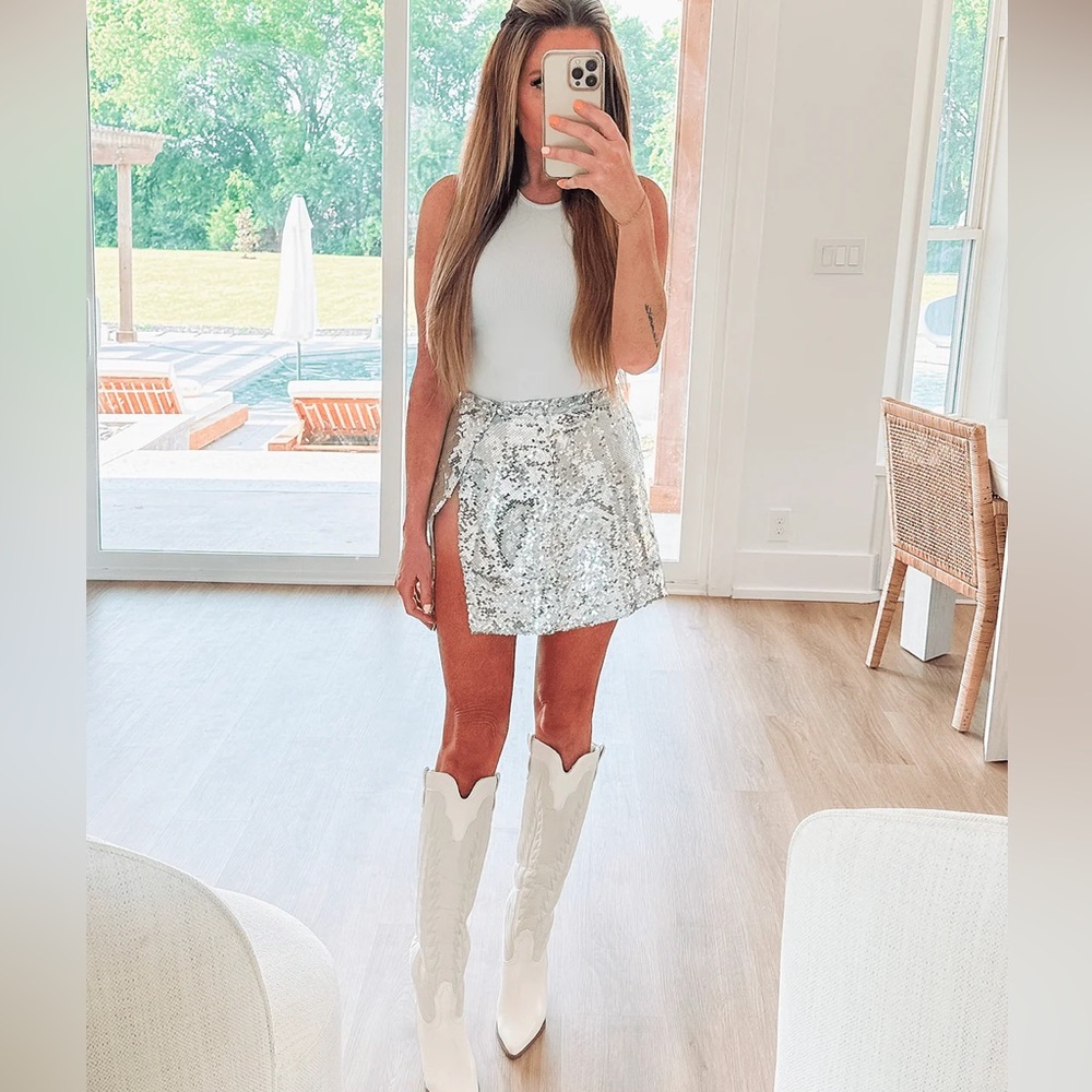 Sequin mini skirt. New without tags. Size small.